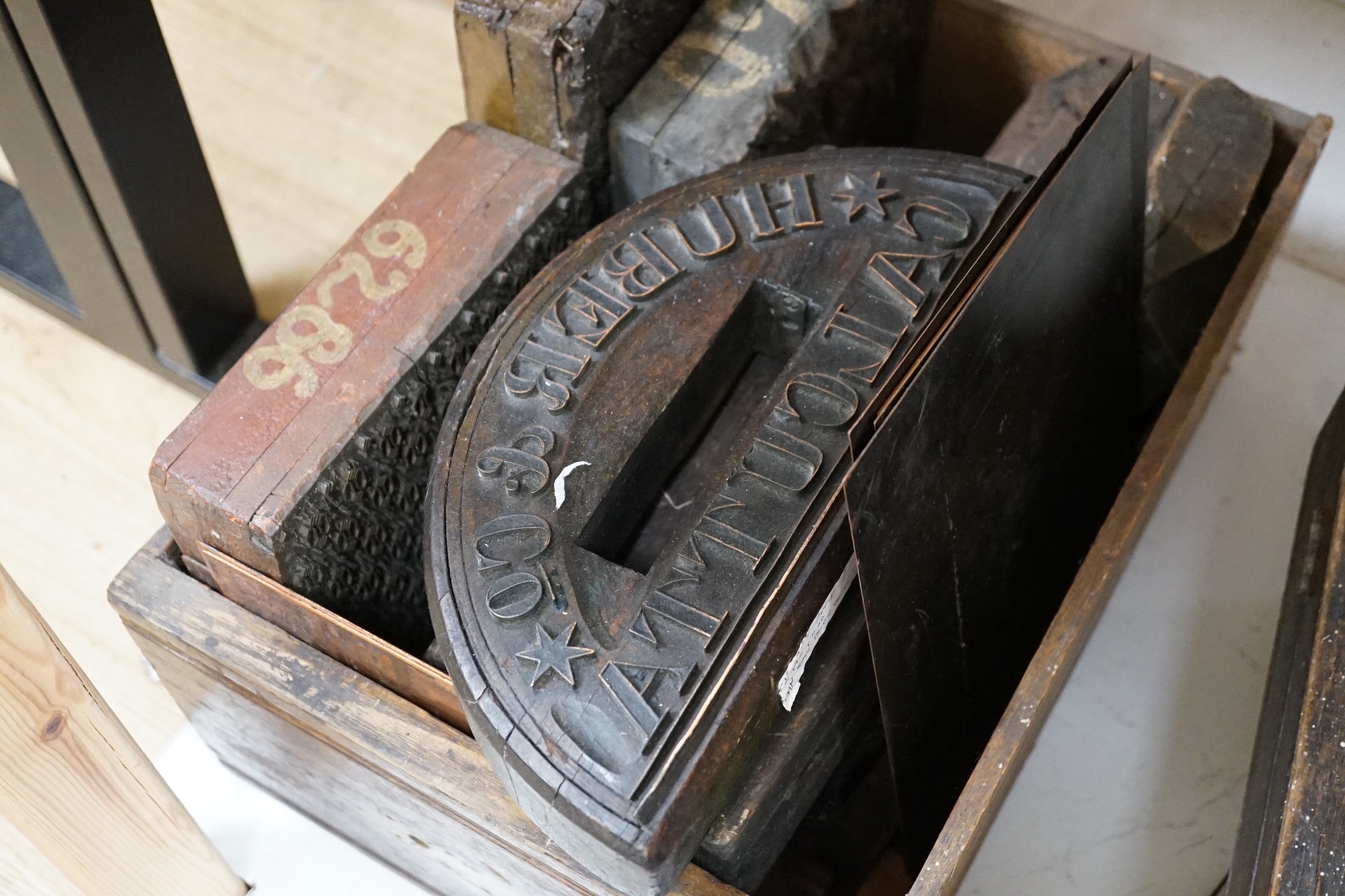 A selection of decorative metal and wooden printing blocks, mainly 20th century examples